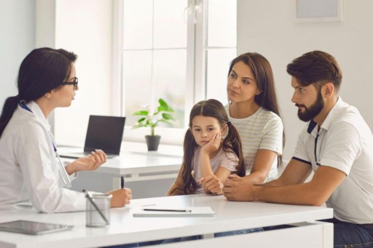 a family discussing about health insurance
